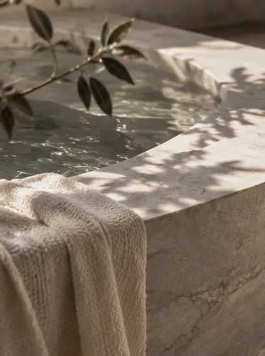 Stone pool and linen